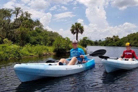 a small boat in a body of water